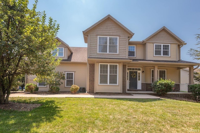 view of front facade with a front yard