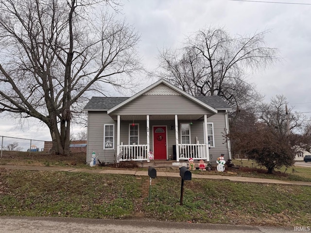 bungalow with a front lawn