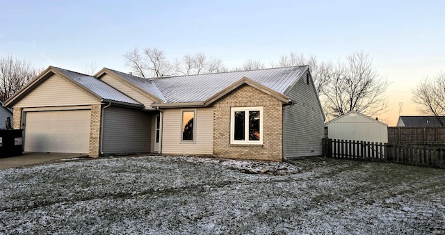 single story home with a garage