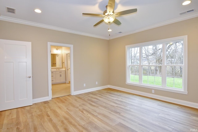 unfurnished bedroom featuring connected bathroom, ceiling fan, and ornamental molding