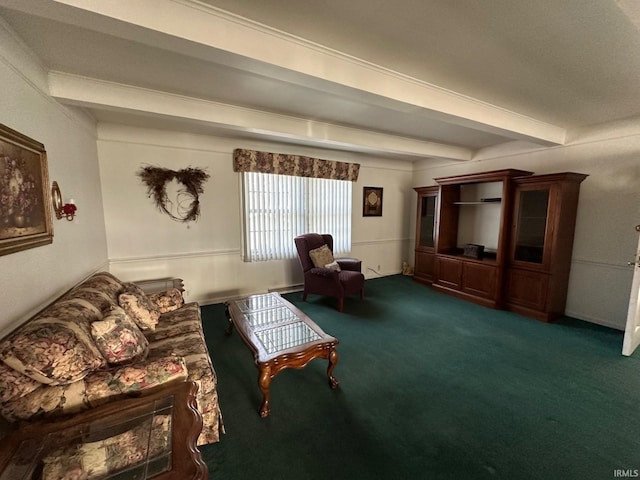 carpeted living room featuring beamed ceiling