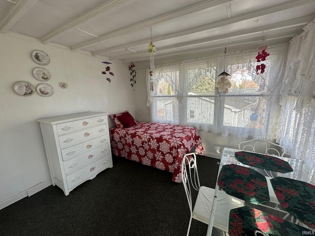 bedroom featuring beam ceiling