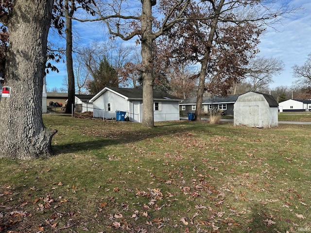 view of yard featuring a storage unit