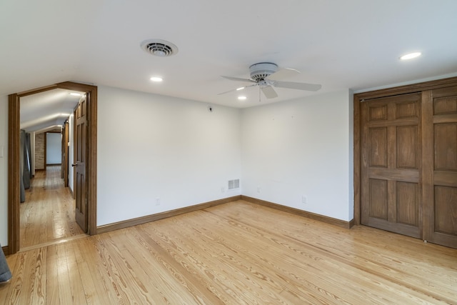 unfurnished bedroom featuring ceiling fan and light wood-type flooring