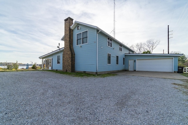 view of property exterior featuring a garage