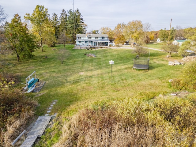 view of yard featuring a trampoline