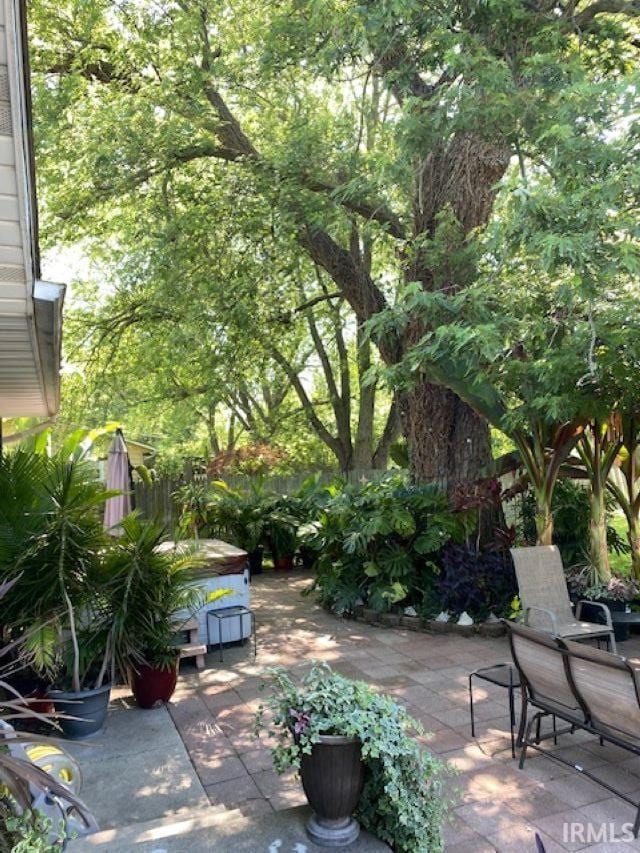 view of patio / terrace featuring a jacuzzi