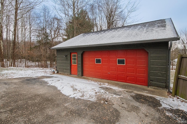 view of snow covered garage