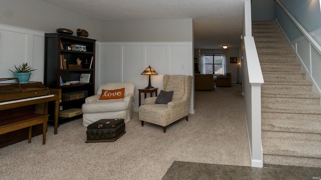 living area with carpet flooring