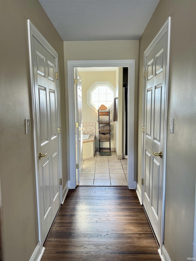 hallway featuring light hardwood / wood-style floors