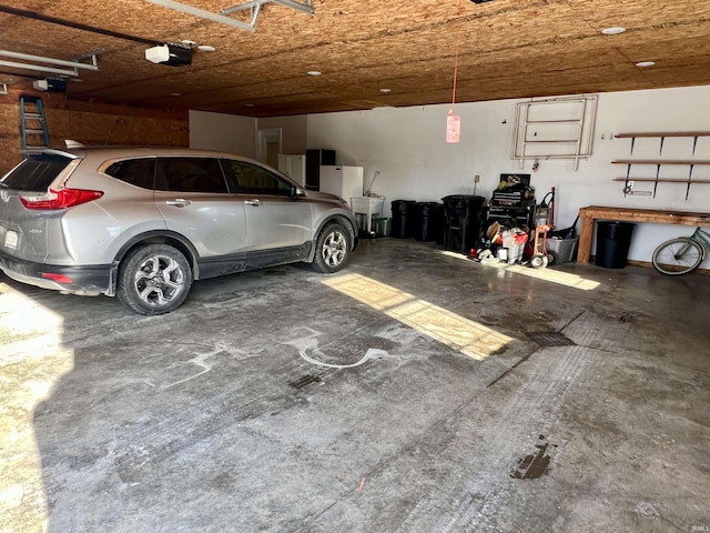 garage featuring a garage door opener