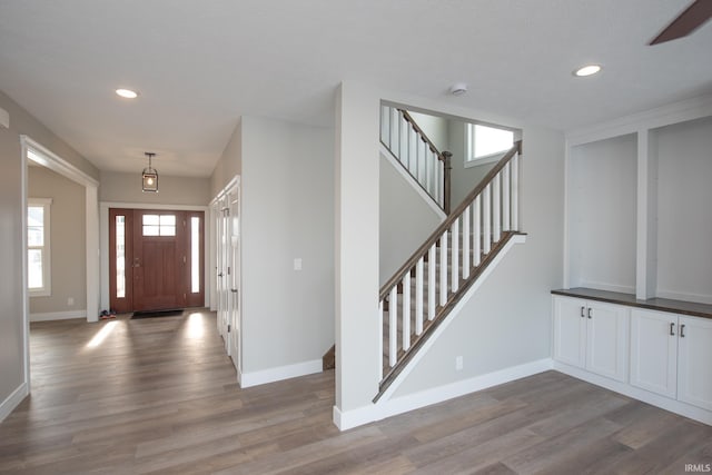 foyer with light hardwood / wood-style floors