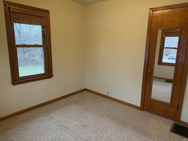 view of carpeted spare room