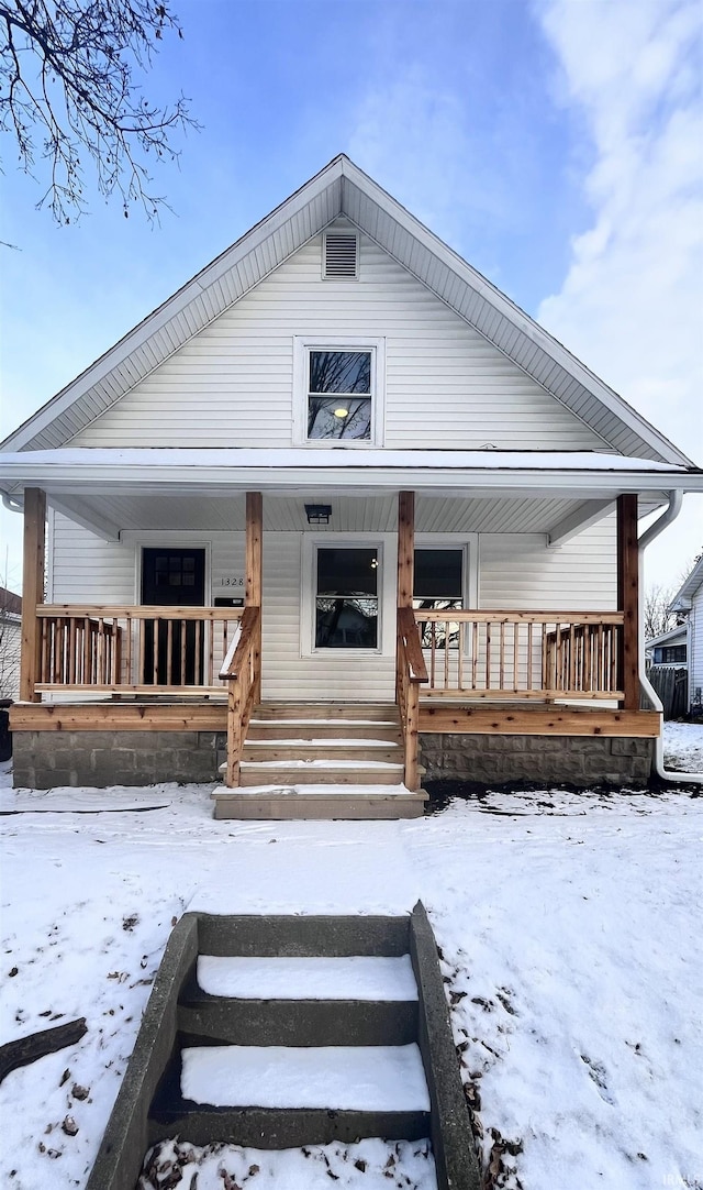 view of snow covered house