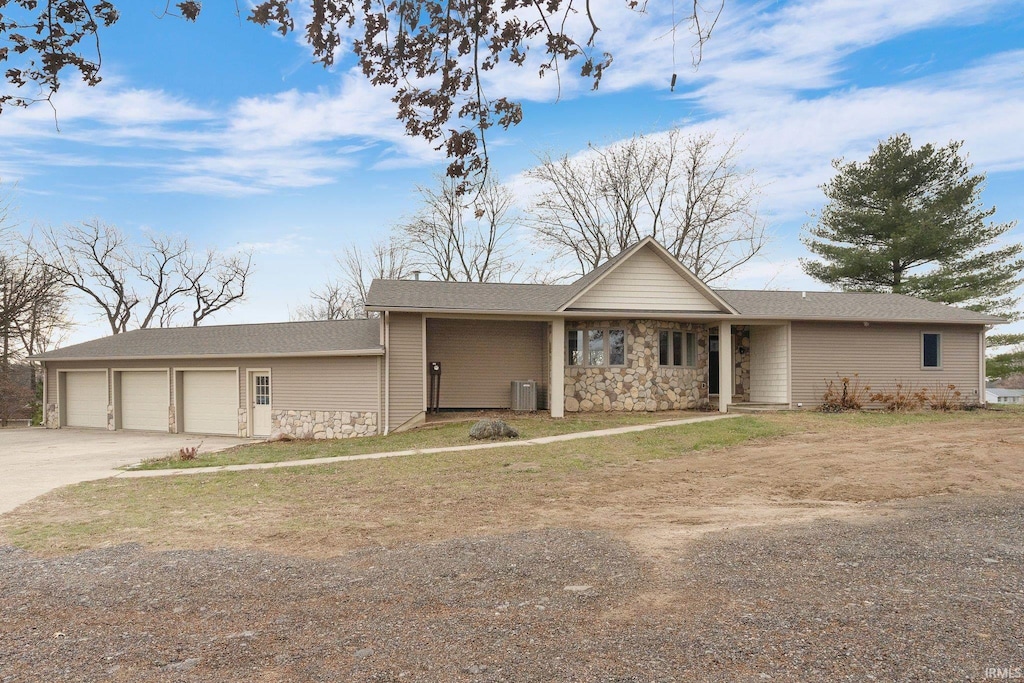 ranch-style house featuring a garage