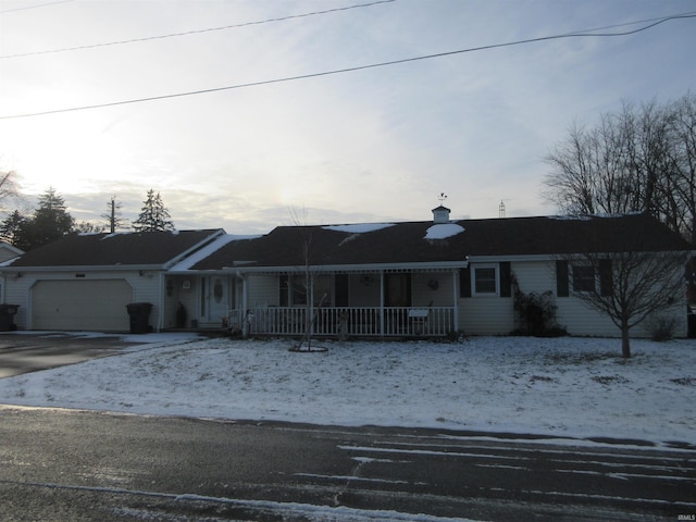 ranch-style house featuring a garage