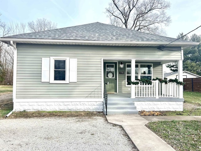 bungalow-style house featuring covered porch