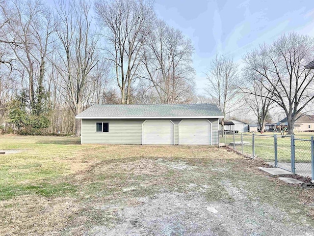 garage with a yard