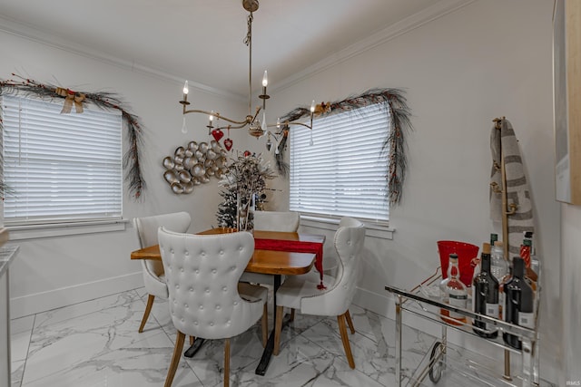 dining space with a notable chandelier and ornamental molding