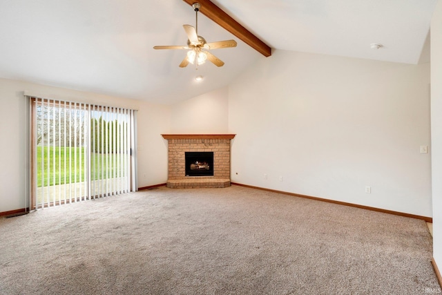 unfurnished living room with carpet flooring, lofted ceiling with beams, a brick fireplace, and ceiling fan