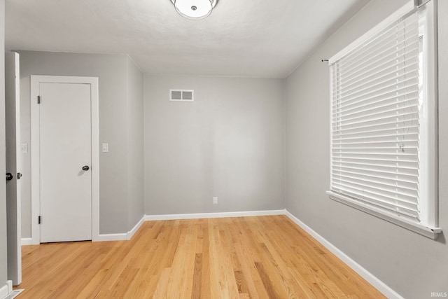 empty room featuring light hardwood / wood-style floors