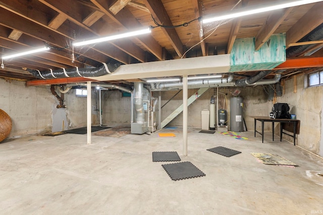 basement with heating unit and water heater