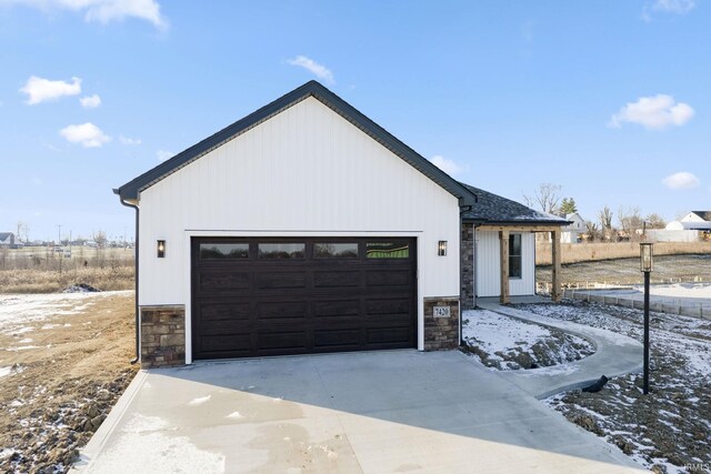 modern farmhouse style home with a garage