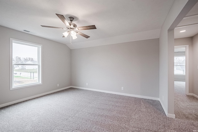 unfurnished room featuring ceiling fan and light colored carpet