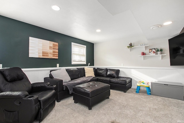 living room featuring light carpet