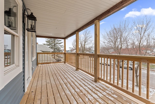 view of snow covered deck