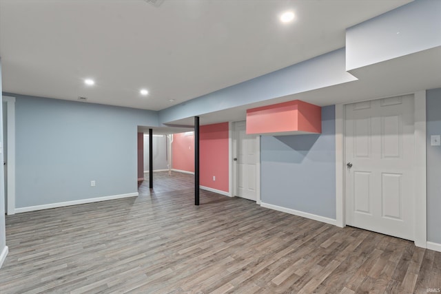 basement with light wood-type flooring