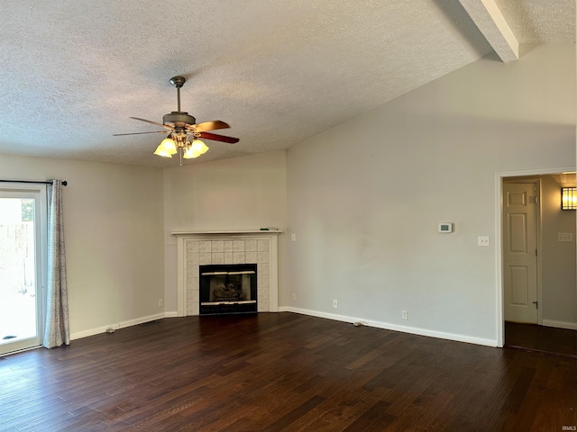 unfurnished living room featuring ceiling fan, a fireplace, and dark wood-type flooring