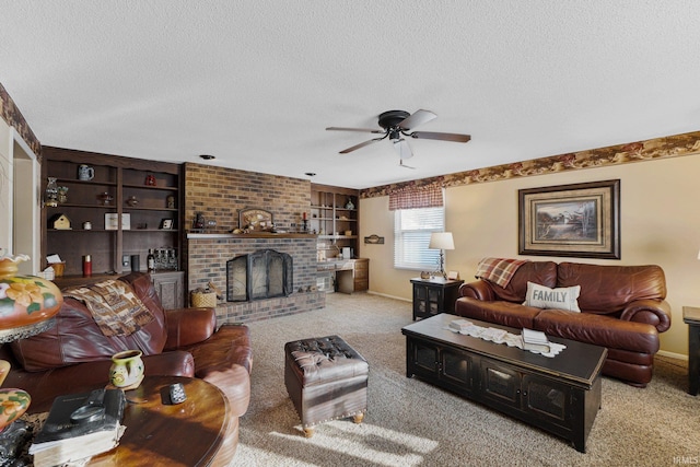 living room featuring ceiling fan, a textured ceiling, light carpet, and a brick fireplace