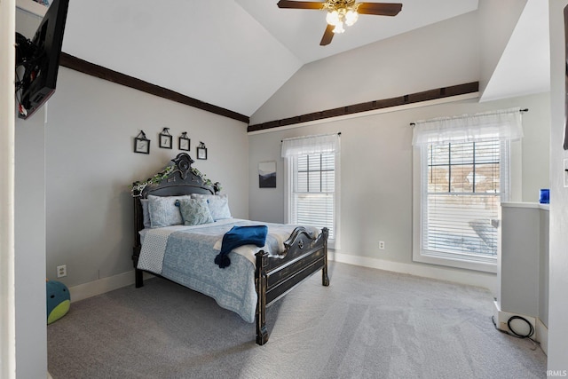 carpeted bedroom featuring ceiling fan and vaulted ceiling