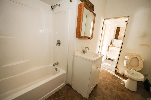 full bathroom with shower / bathing tub combination, vanity, and toilet