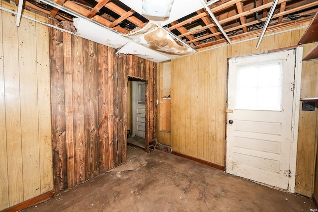 basement with wood walls