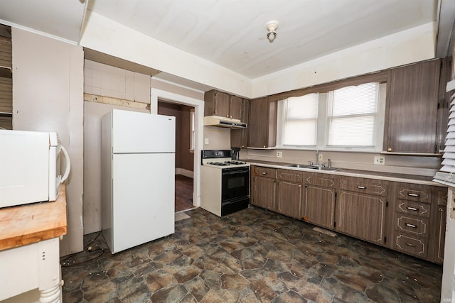 kitchen featuring dark brown cabinets, white appliances, and sink