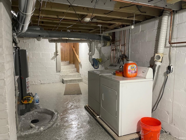 basement featuring washing machine and clothes dryer