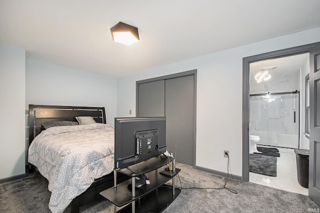 carpeted bedroom featuring ensuite bathroom