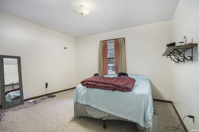 carpeted bedroom with a textured ceiling