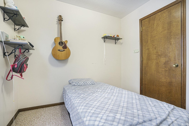 bedroom with a textured ceiling