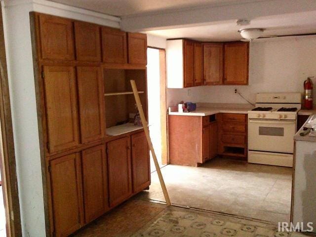 kitchen featuring white gas range oven