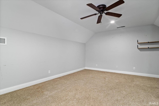 bonus room with carpet floors, vaulted ceiling, and ceiling fan