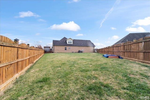 view of yard featuring central AC unit