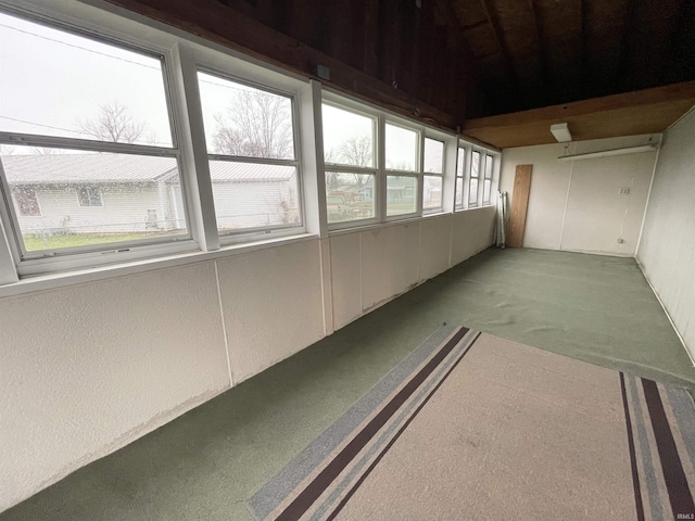 unfurnished sunroom with a healthy amount of sunlight