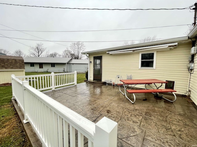 wooden deck featuring a patio