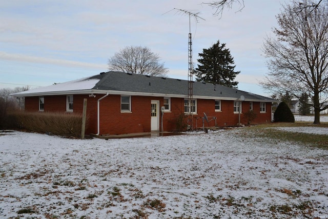 view of snow covered house