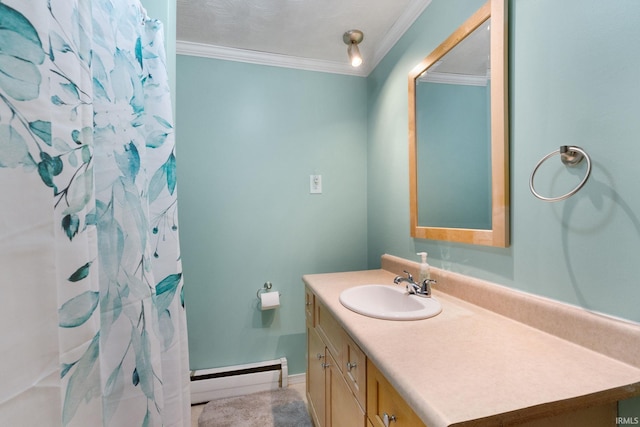 bathroom with a shower with curtain, vanity, a baseboard heating unit, and crown molding