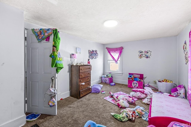 carpeted bedroom with a textured ceiling