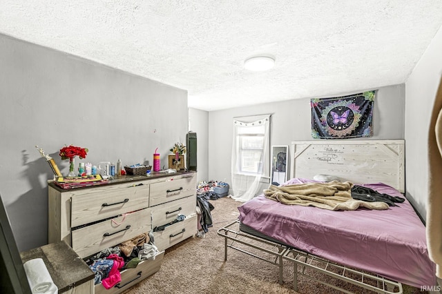 carpeted bedroom with a textured ceiling